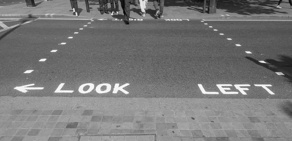 Black and white Look Left sign — Stock Photo, Image