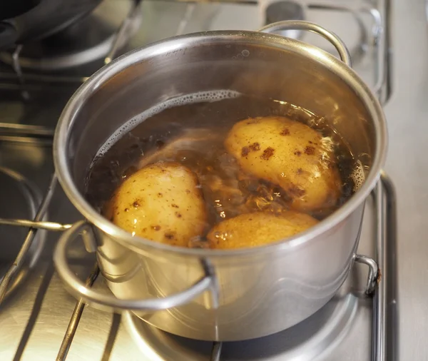 Boiling potato in saucepan — Stock Photo, Image