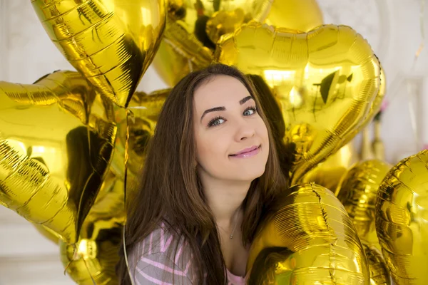 Young happy blonde woman with baloons smiling close up — Stock Photo, Image