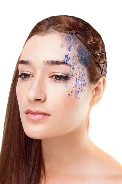 Beautiful fashionable young woman with creative hairstyle with blue art make up — Stock Photo, Image