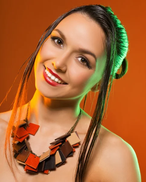 Sexy woman with fashionable hairstyle poses in studio — Stock Photo, Image