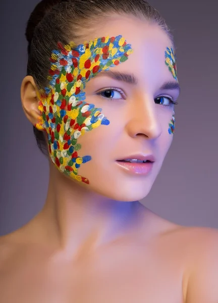 Žena s kreativní světlé make-upu — Stock fotografie