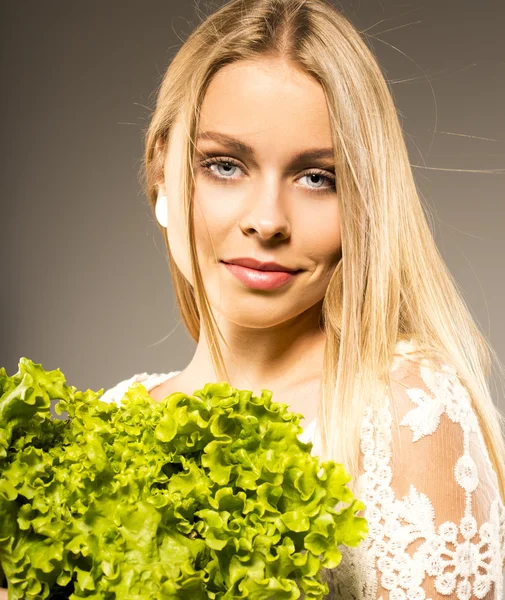 Blonde with green salad — Stock Photo, Image