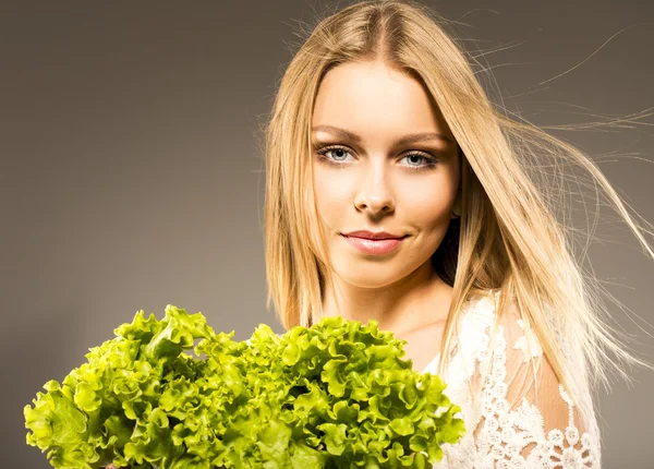 Green salad. healthy lifestyle, woman in the studio — Stock Photo, Image