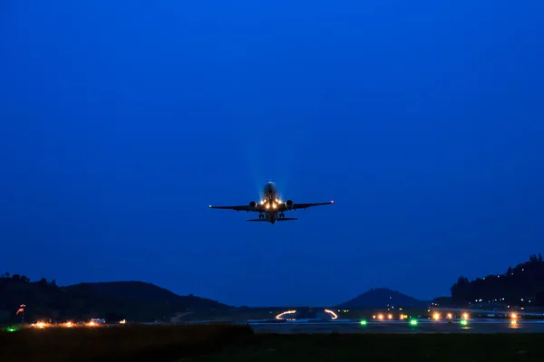 Passenger Airplane take off at night