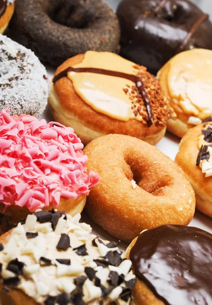 Muchos color dulce Donuts — Foto de Stock