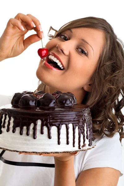 Eating chocolate cake with cherry — Stock Photo, Image