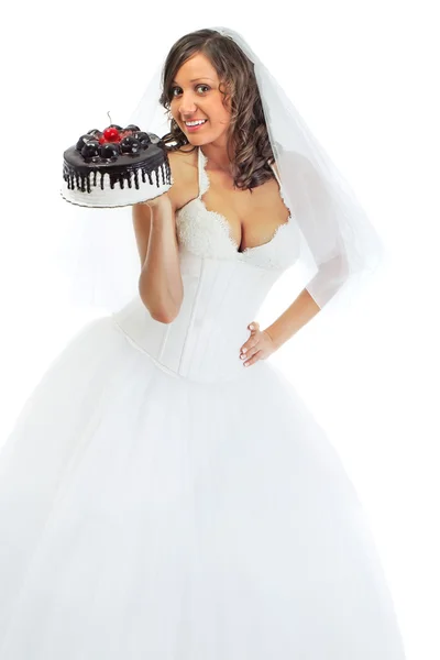 Giovane sposa mangiare torta — Foto Stock