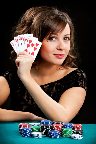 Mujer joven con fichas de juego — Foto de Stock