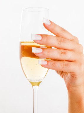 kadın eli ile Şarap kadehi
