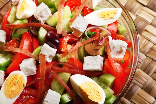 Salad with tomato, eggs, cucumbers and cheese — Stock Photo, Image