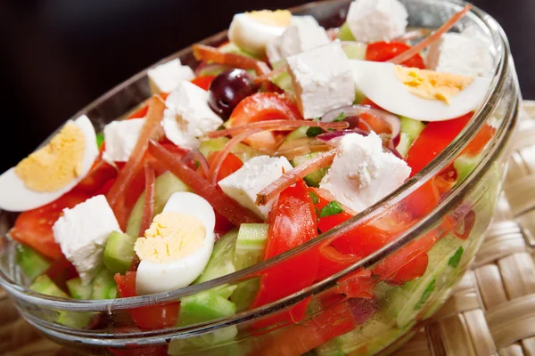Salad with tomato, eggs, cucumbers and cheese — Stock Photo, Image