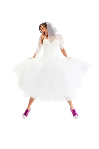 Jumping bride wearing sneakers — Stock Photo, Image