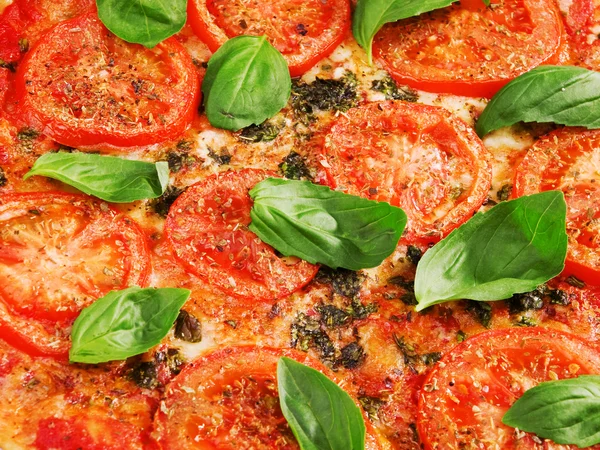 Margharita Pizza als achtergrond — Stockfoto