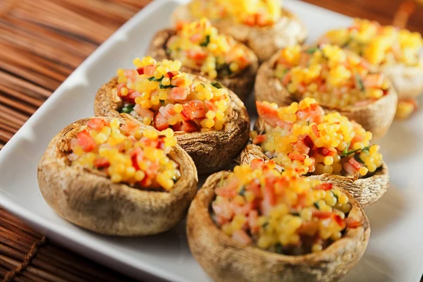 Mushrooms stuffed with couscous — Stock Photo, Image