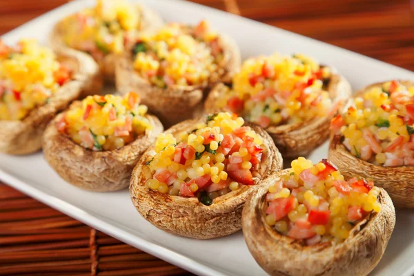 Mushrooms stuffed with couscous — Stock Photo, Image