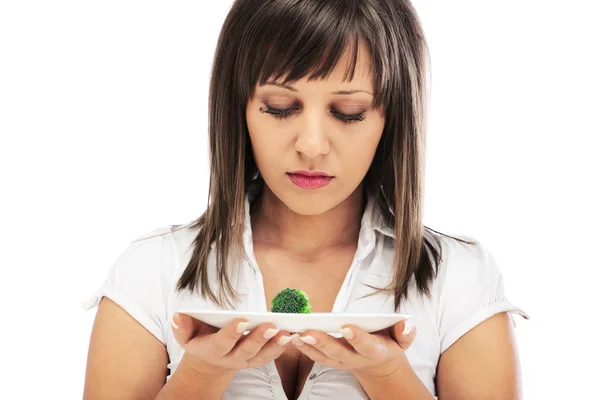 Woman unhappy for eating healthy — Stock Photo, Image