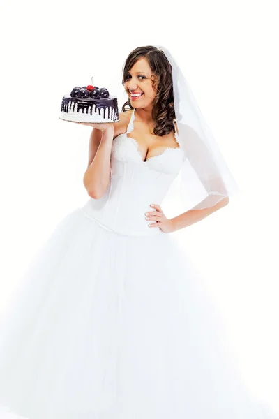 Giovane sposa mangiare torta — Foto Stock