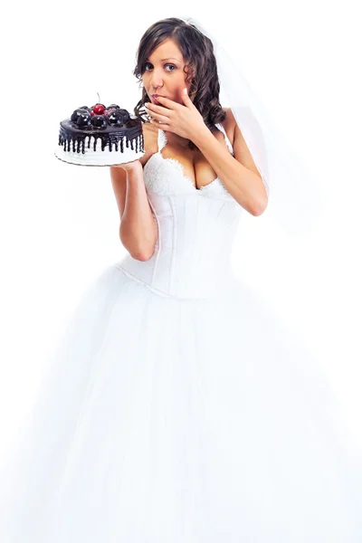 Fiatal menyasszony enni tortát — Stock Fotó