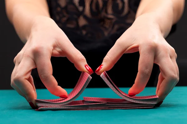 Shuffling playing cards — Stock Photo, Image