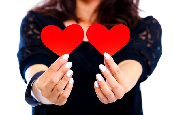 Young woman with red hearts — Stock Photo, Image