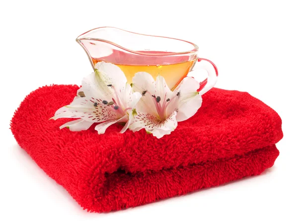 Aromatiska spa olja och blommor — Stockfoto