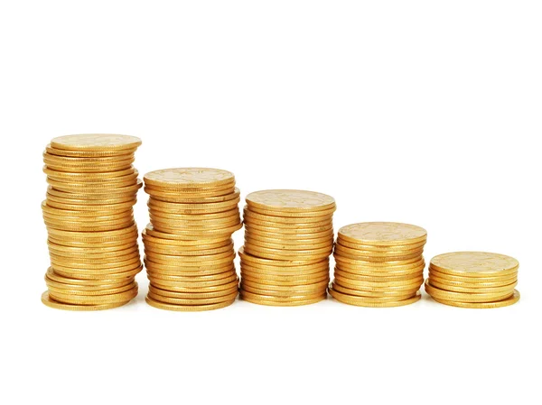 Žlutá hromádky mincí — Stock fotografie