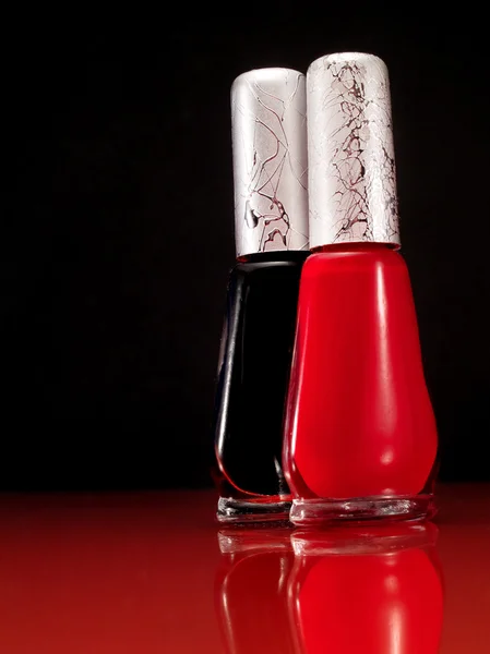 Red and black nail polish — Stock Photo, Image