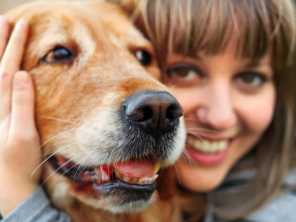 Young girl with dog — Stock Photo, Image