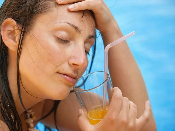 Woman with orange juice — Stock Photo, Image