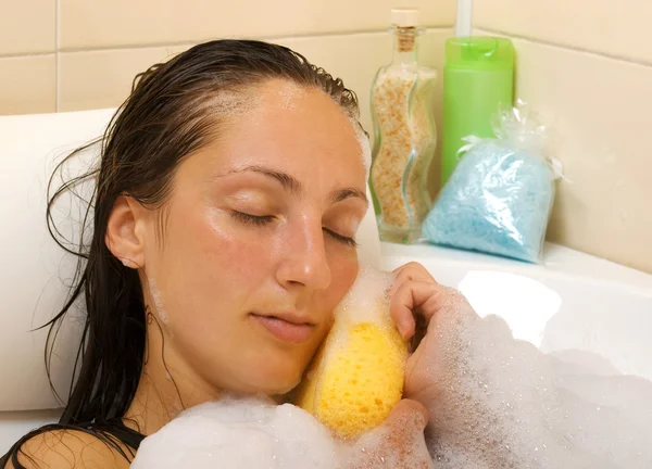 Young woman in bathtub — Stock Photo, Image