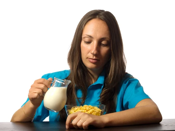 Mujer comiendo cereal desayuno — Foto de Stock