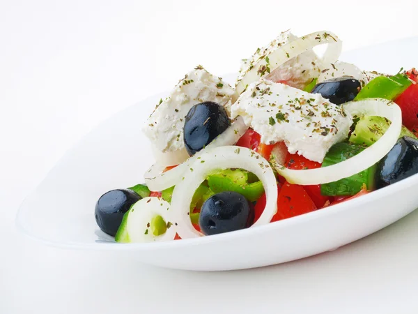Greek salad on white — Stock Photo, Image