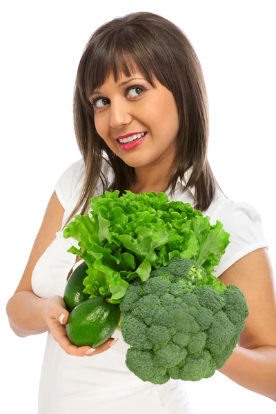 Young woman holding broccoli — Stock Photo, Image