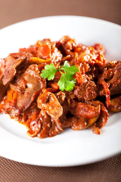 Chicken livers with tomato sauce — Stock Photo, Image