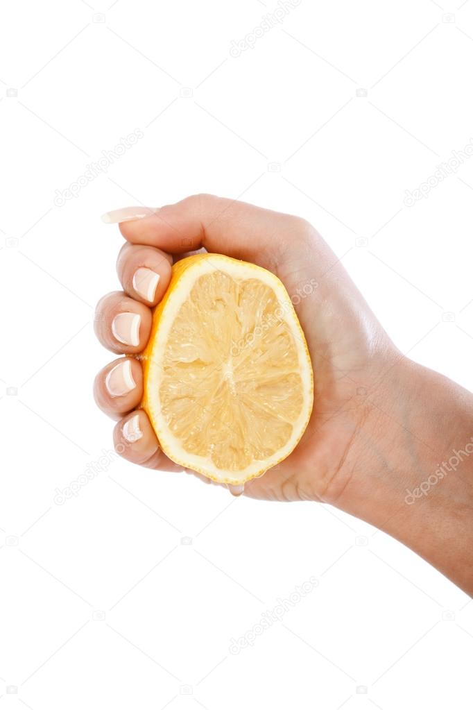 woman squeezing lemon