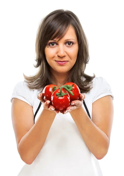 Jonge vrouw met tomaten — Stockfoto