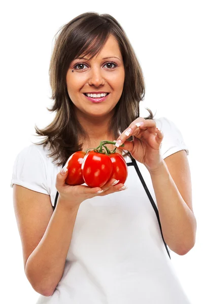 Mulher segurando tomates frescos — Fotografia de Stock