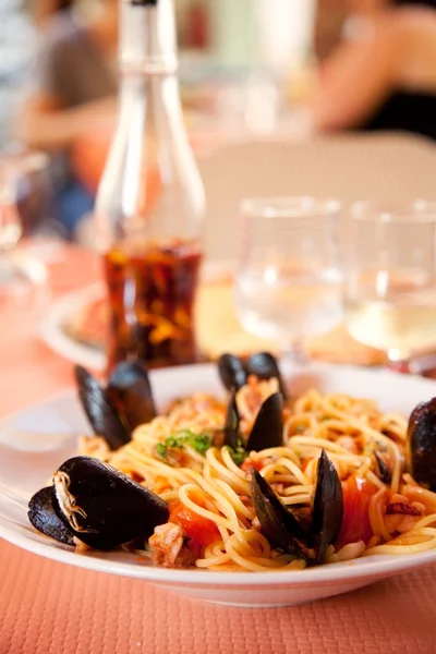 Spaghetti with seafood in plate — Stock Photo, Image