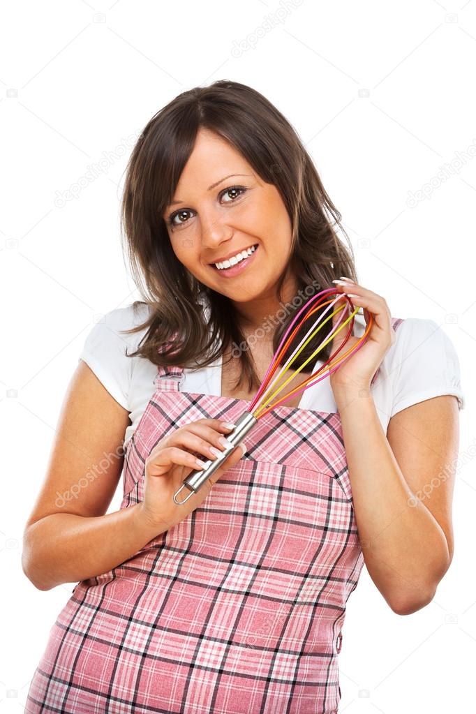 Young woman holding egg whisker