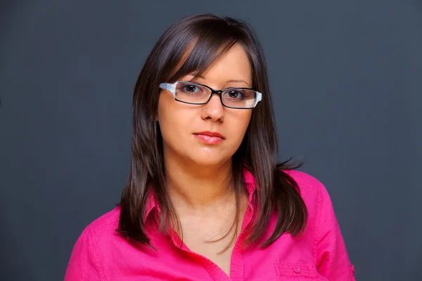 Mujer joven en gafas graduadas —  Fotos de Stock