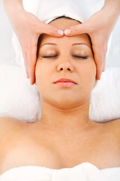 Young woman having massage — Stock Photo, Image