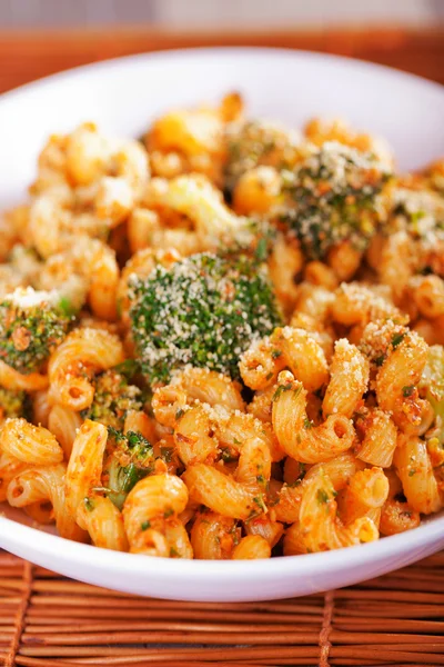 Pasta with broccoli and tomato sauce — Stock Photo, Image