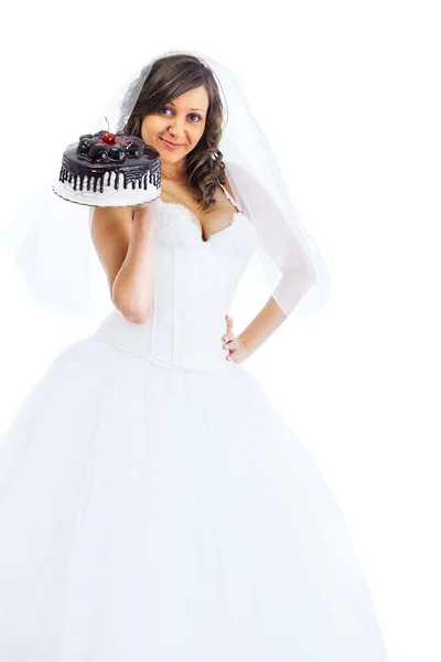 Giovane sposa mangiare torta — Foto Stock