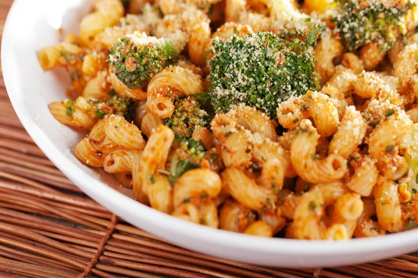 Pasta with broccoli and tomato sauce — Stock Photo, Image