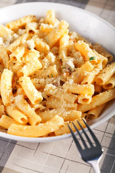 Penne with tomatoes and  cheese — Stock Photo, Image