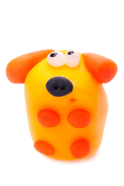 Cão laranja feito de argila de polímero — Fotografia de Stock