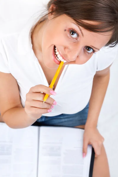 Young woman making notes — Stock Photo, Image