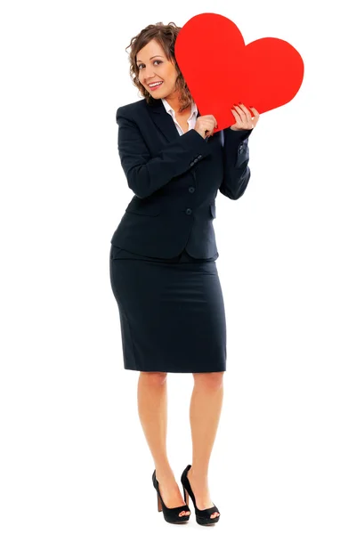 Businesswoman holding red paper heart — Stock Photo, Image