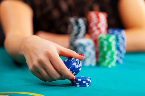 Young woman with gambling chips — Stock Photo, Image